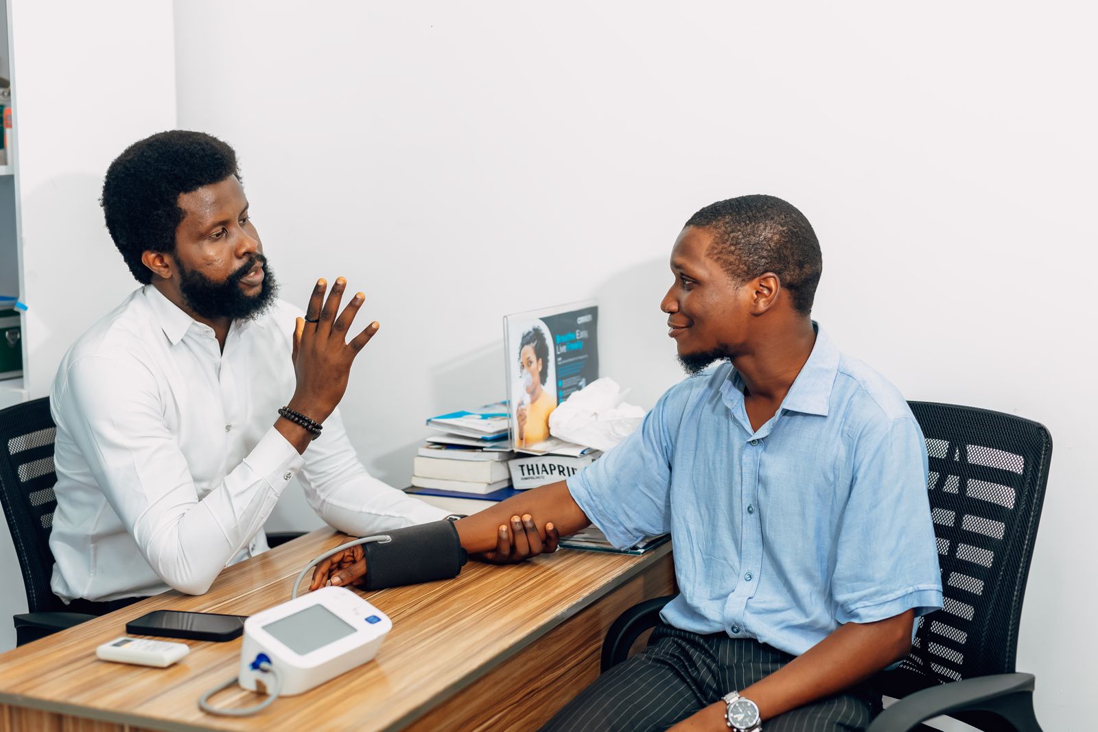 A clinician carrying out a health screening